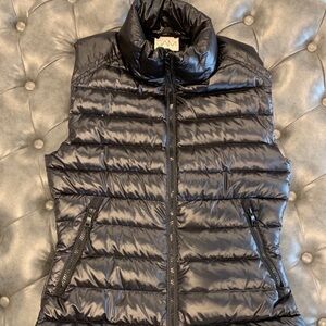 SAM. black puffer vest